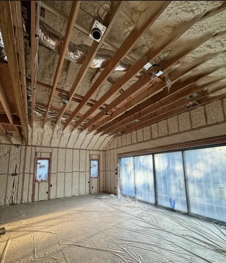 Interior walls and ceiling insulated with spray foam during new construction in Pontiac